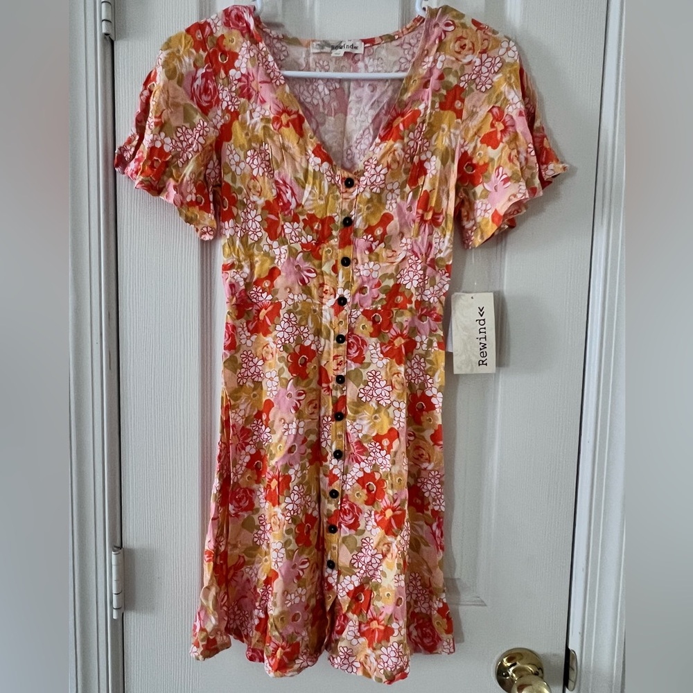It’s mini maxi frock never worn brand new with tags.